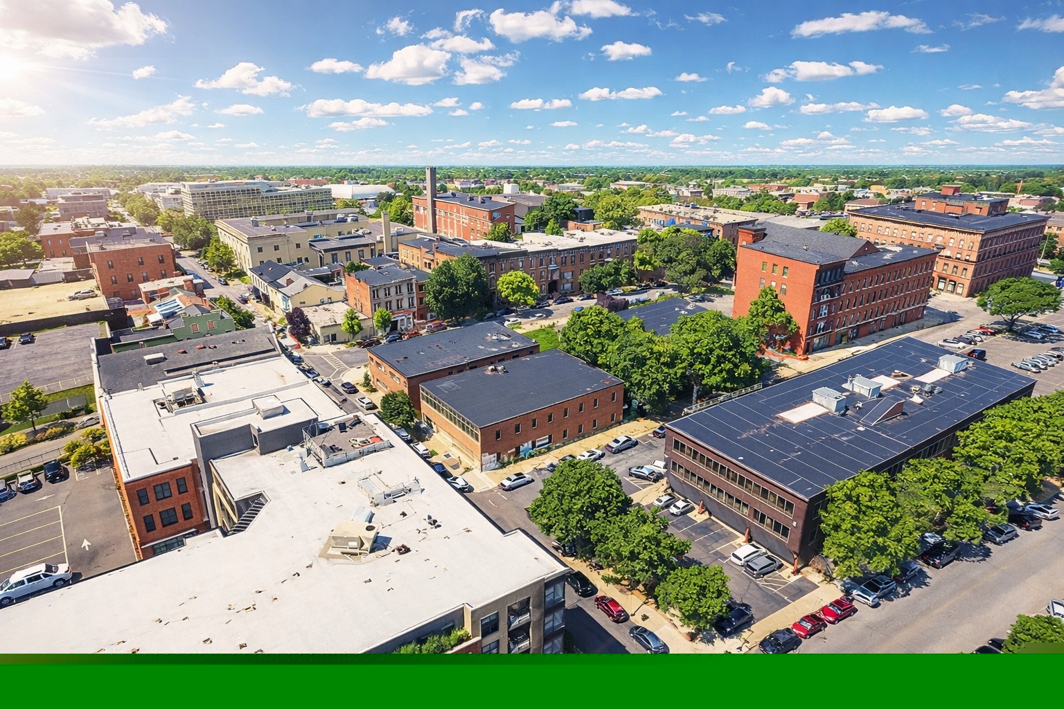 Aerial view of the 504 Broadway project site and surrounding downtown Troy streetscape
